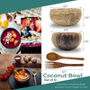 Coconut bowls with spoons and forks